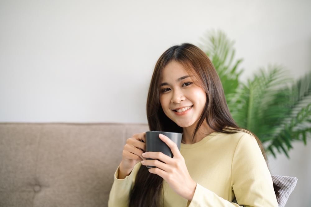 Woman enjoying herbal drinks for tea time
