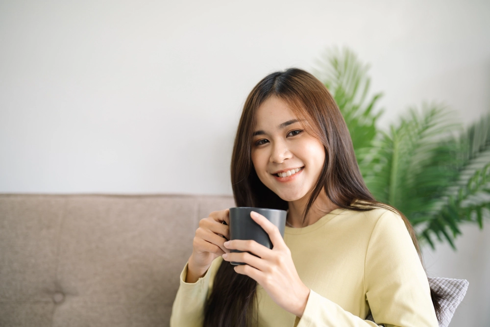 Woman enjoying herbal drinks for tea time