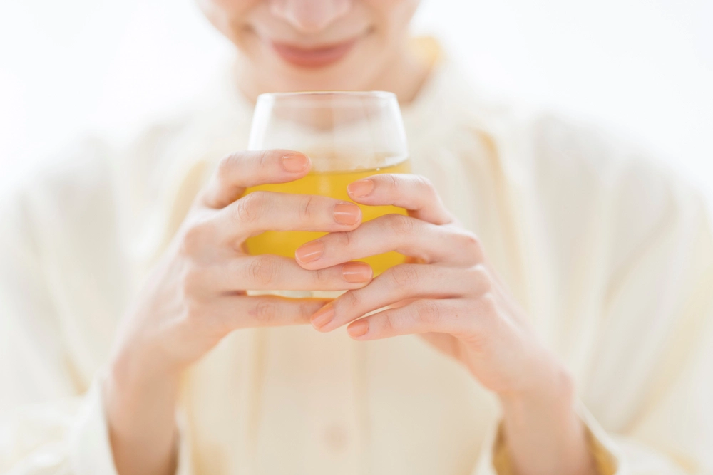 Woman drinking herbal drinks for her natural health